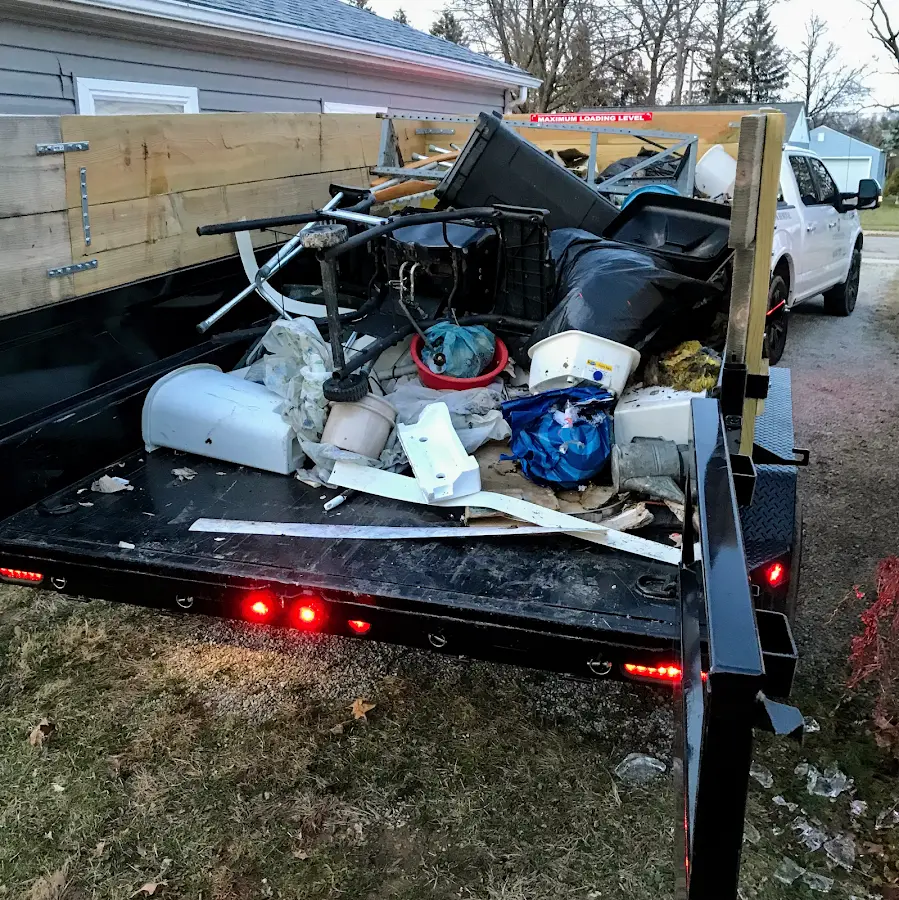 Roll-off dumpster delivered to a residential driveway in Norco